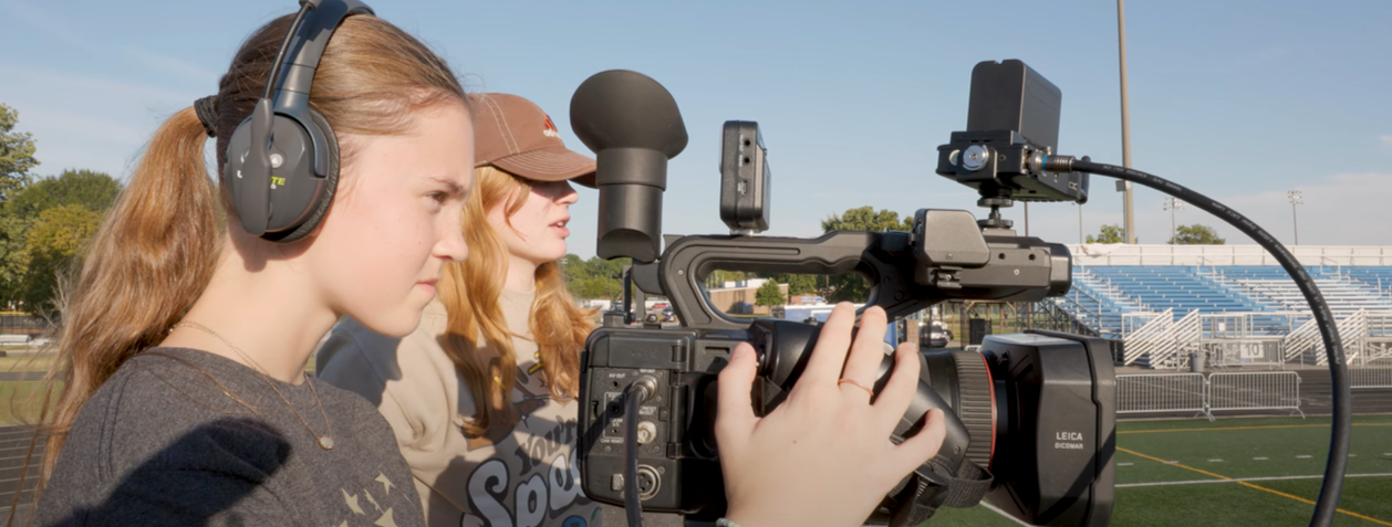 Student working the camera.